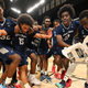 The unlikely contenders from St. Peter’s dance on the court after a win.